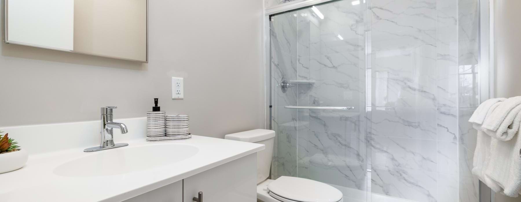a bathroom with a glass shower