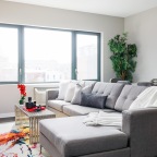 a living room with a couch and a tv