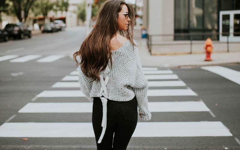 a person walking in a crosswalk