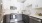 a kitchen with white cabinets